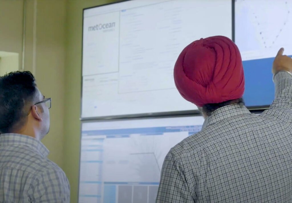 A photo of engineers at work in the MetOcean office